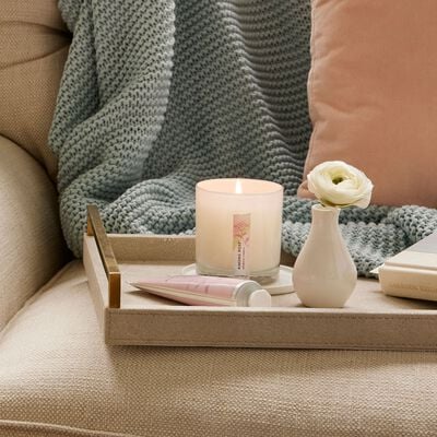 Thymes Kimono Rose Poured Candle on tray with Thymes Kimono Rose Hand Cream and flower vase